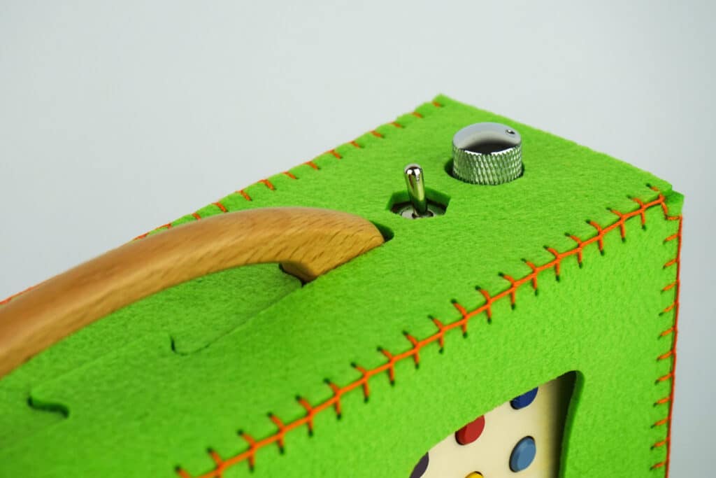 Detailansicht einer grünen hörbert-Filztasche